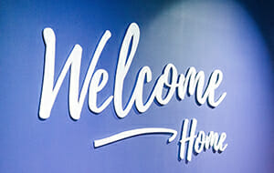 Grace Welcome Home sign by entrance